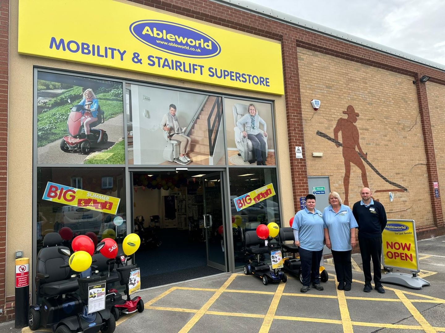 Ableworld Burton new store with friendly staff outside ready to welcome customers into store